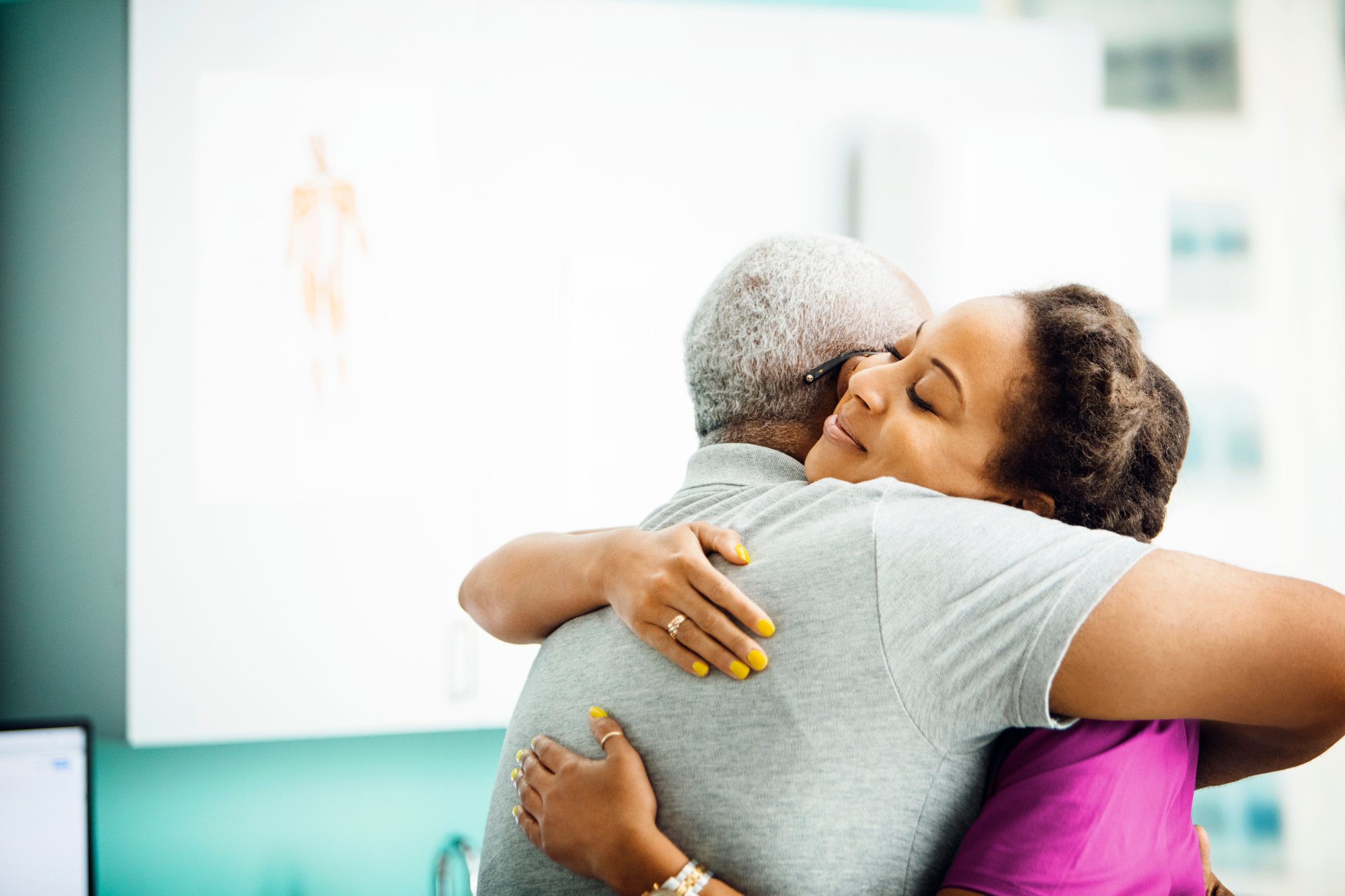 GettyImages-961222238-Patient_Family_Hugging-RET (1)-1